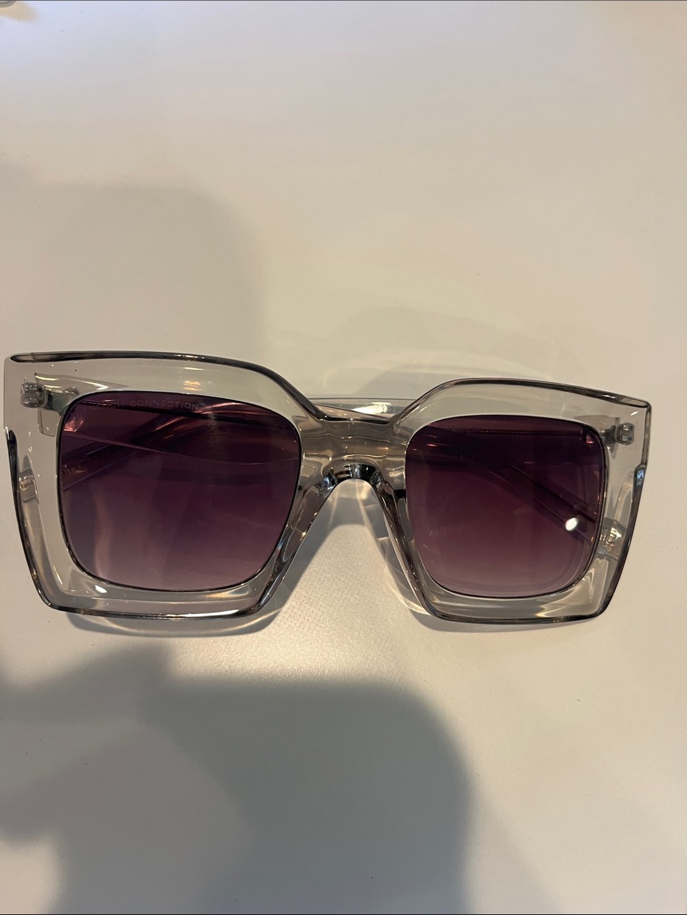 French Connection Clear Frame Sunglasses with Purple Gradient Lenses